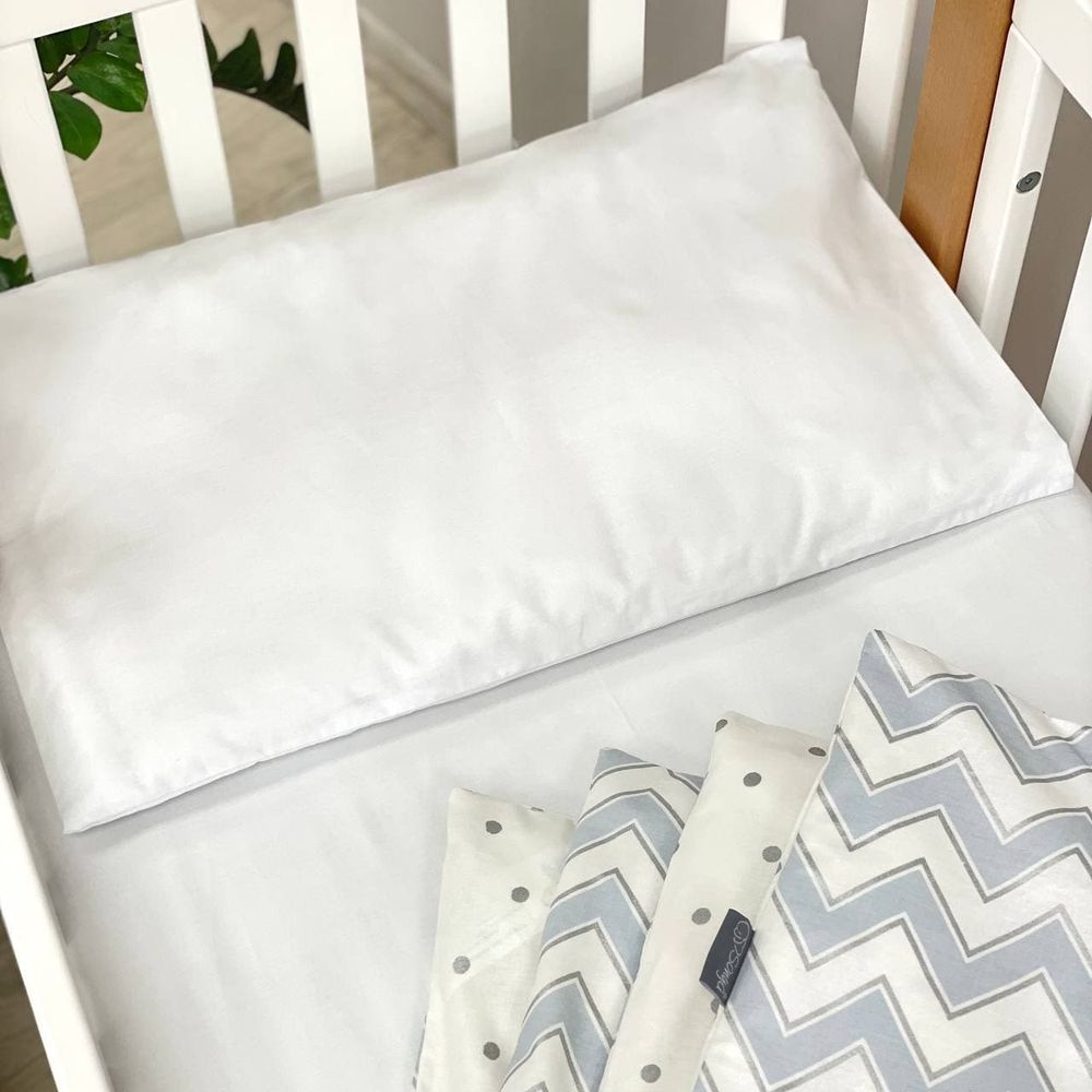 Сменный постельный комплект в кроватку для новорожденных голубой зигзаг фото, цена, описание