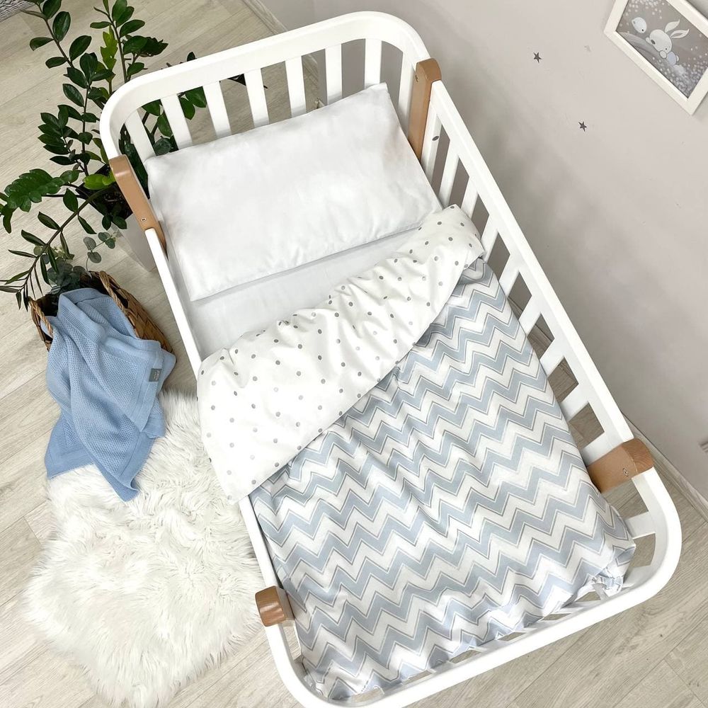 Змінний постільний комплект у ліжечко для новонароджених блакитний зигзаг фото, ціна, опис