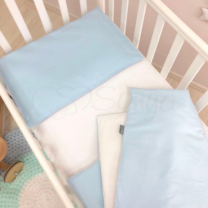 Змінний постільний комплект у ліжечко для новонароджених блакитний фото, ціна, опис