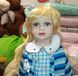 Порцелянова лялька з кошиком 60 см