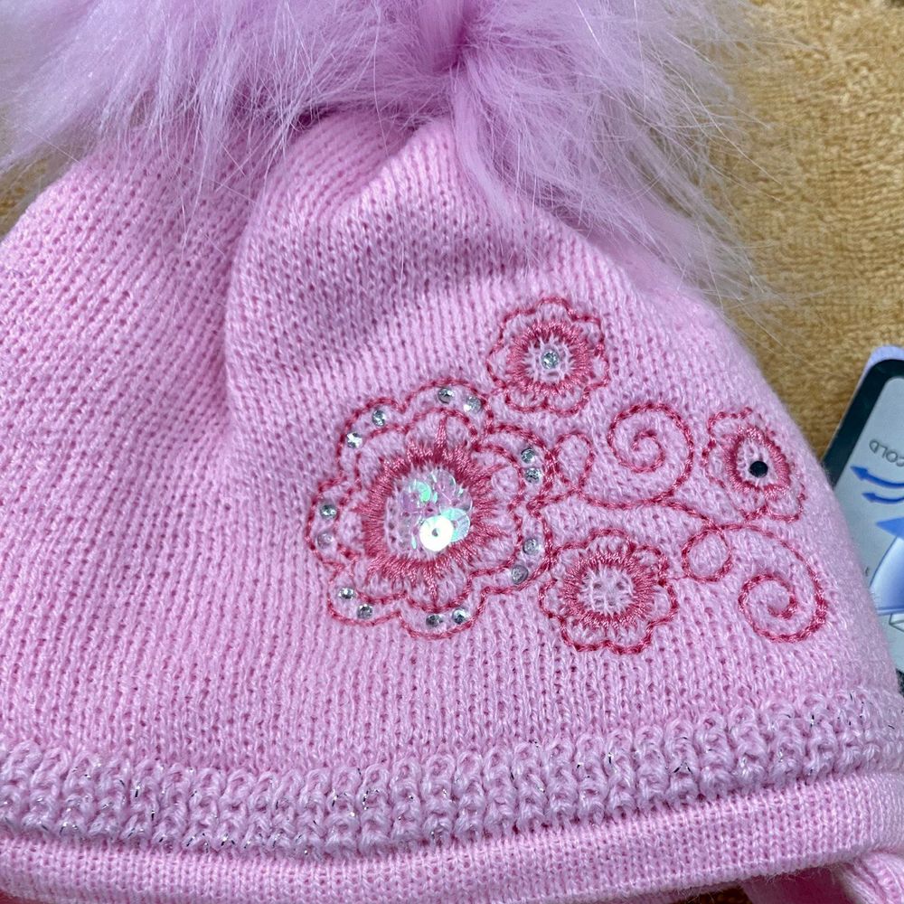 Теплая шапочка Зимние Цветы для новорожденной розовая