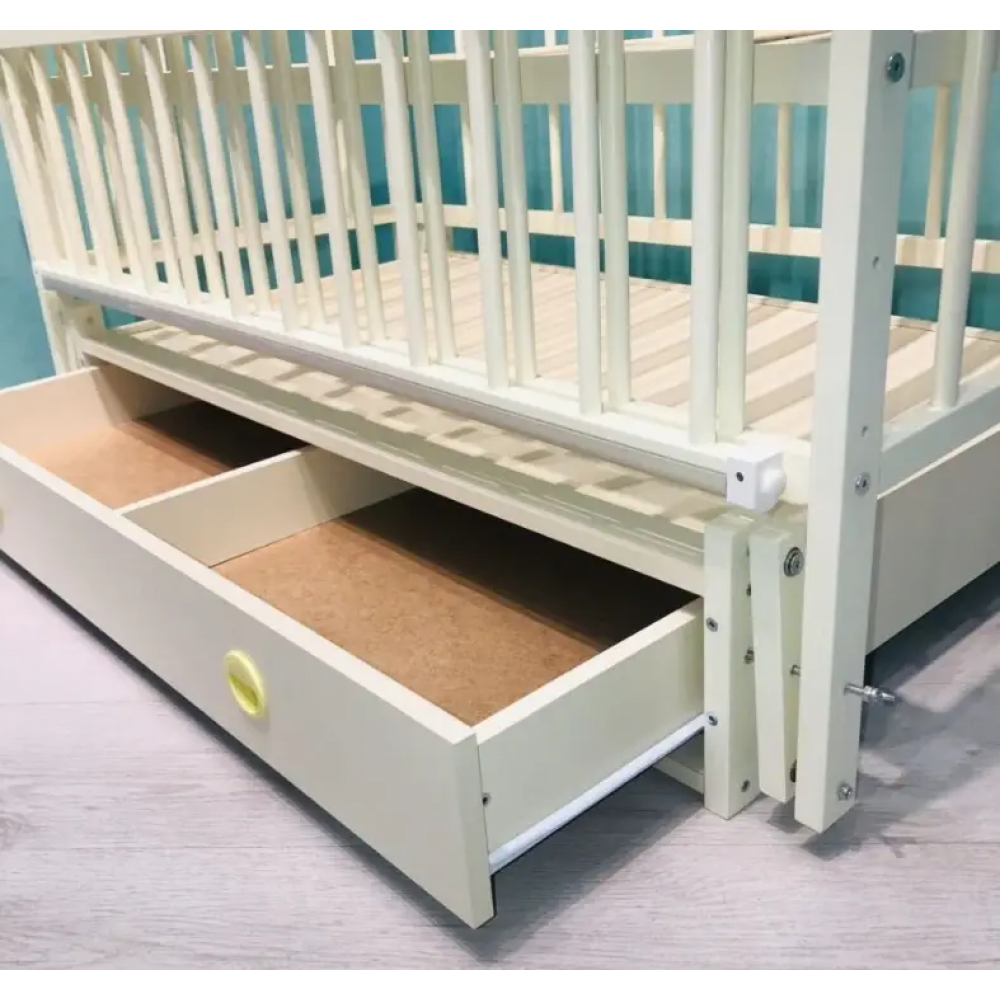 Ліжечко для новонародженого з маятником і ящиком молочне