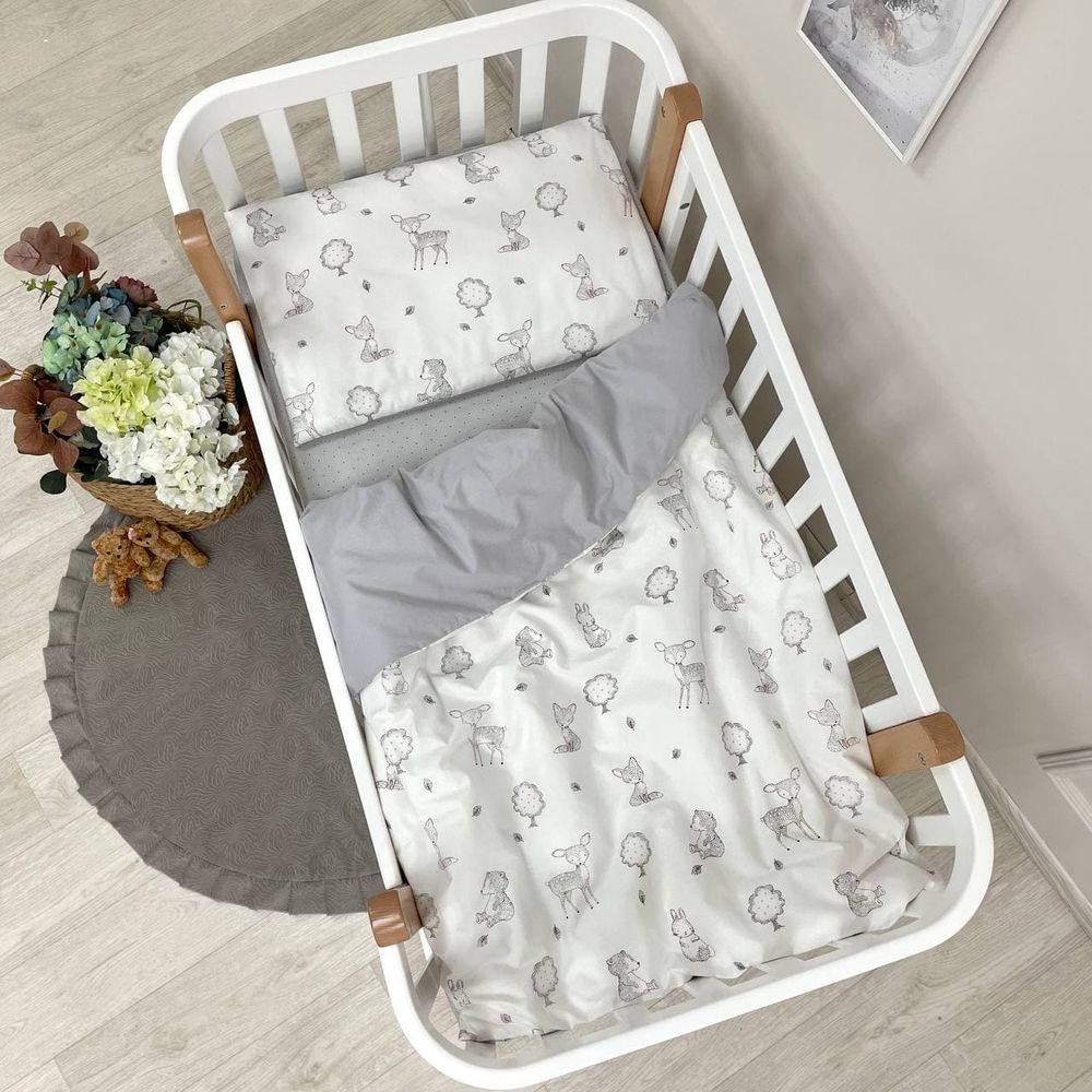 Змінний постільний комплект у ліжечко для новонароджених Звірятка сірі фото, ціна, опис