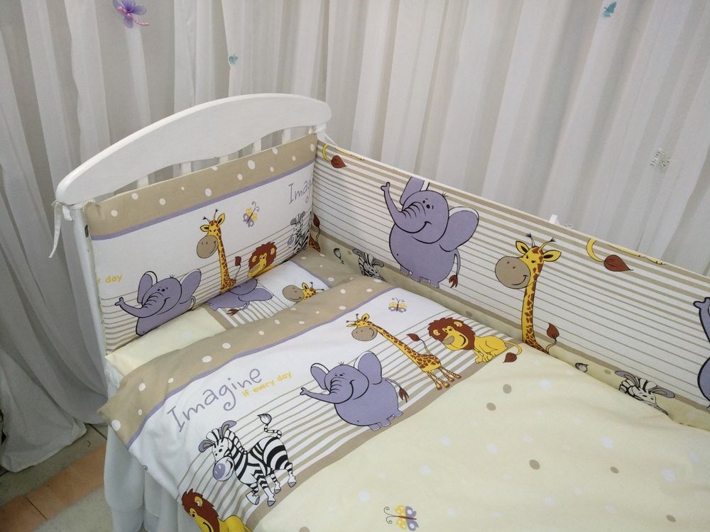 Спальный комплект в кроватку для новорожденного Мультики