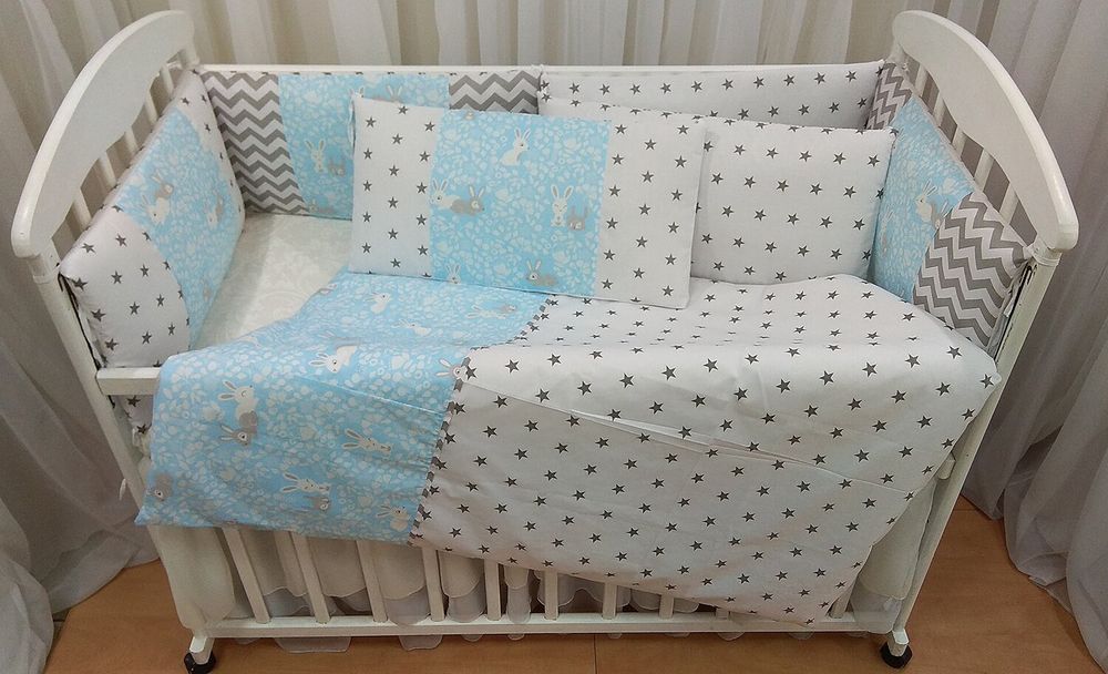 Комплект в кроватку Кролики с бортиками 6 подушек голубой