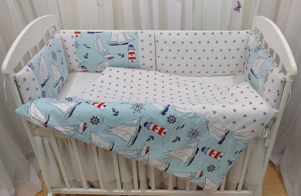 Постільні комплекти в ліжечко для новонароджених МОРСЬКІ ПРИГОДИ 6 подушечок, без балдахіна