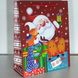 Крепкий средний новогодний бумажный (картонный) подарочный пакет с Глиттером №2 Санта микс 4 дизайна