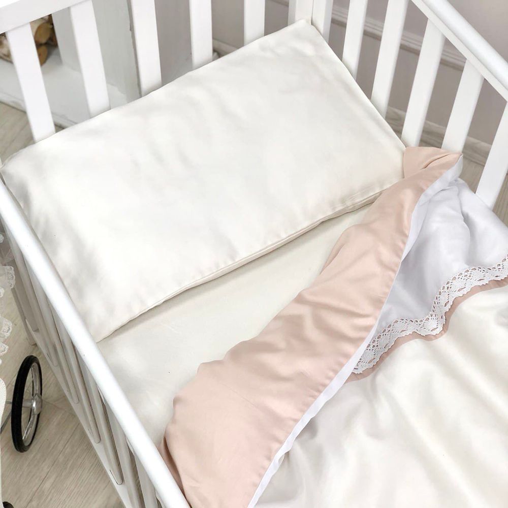 Змінний сатиновий комплект постільної білизни в кроватку для новонародженого 120х60 Зайчики молочні