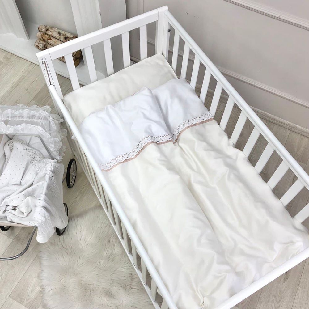 Сатиновое сменное постельное белье для новорожденных Зайчики молочный фото, цена, описание